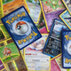 A photo of a giant jumble of my son's Pokemon cards, or as I like to think of them, my empty wallet.